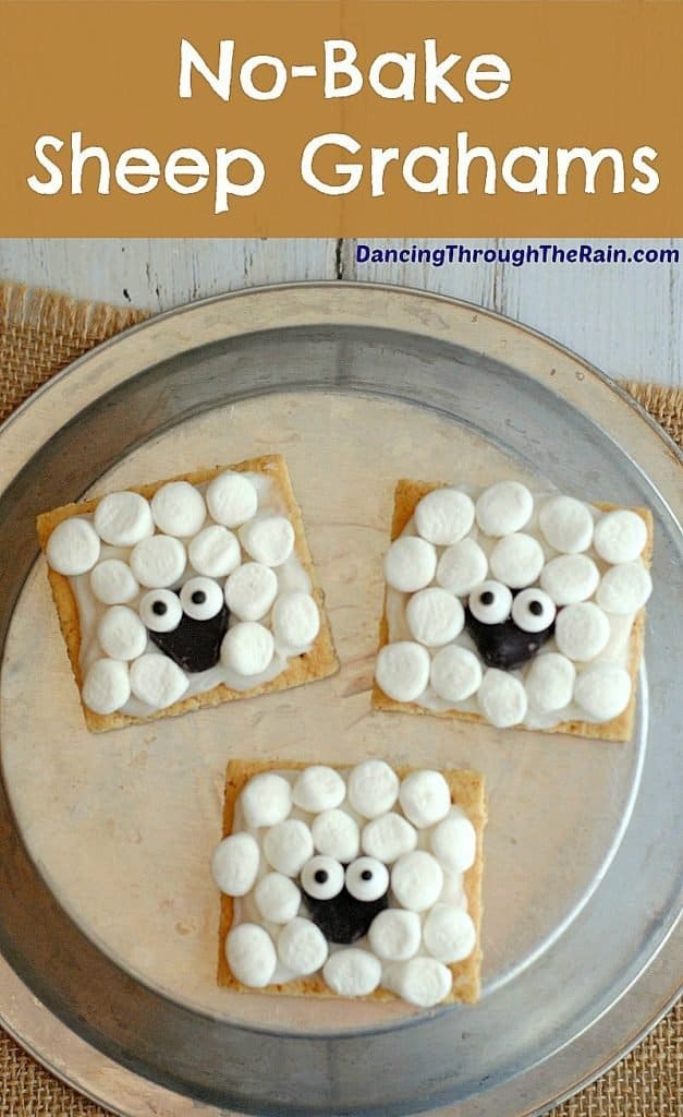 A cute snack of graham crackers and mini marshmallows formed to look like a fluffy sheep