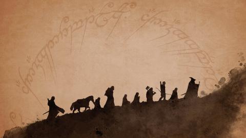 Silhouette of nine characters walking in a line on a hill, with Elvish script in the background.