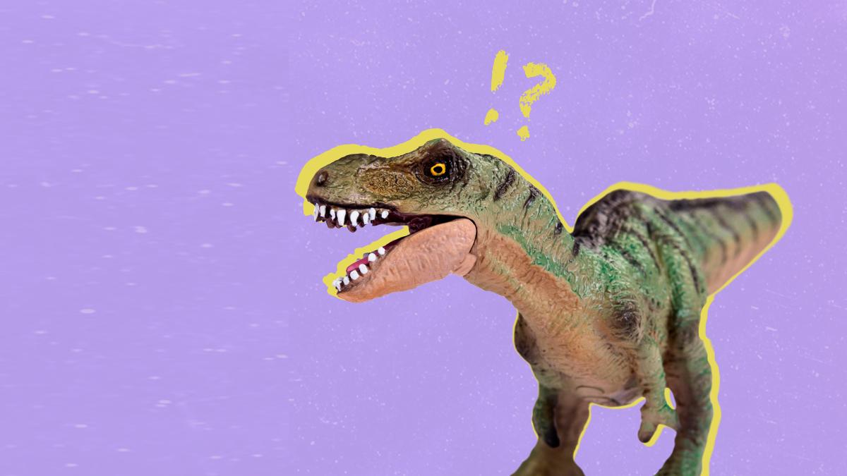 Toy dinosaur on a purple background with a yellow outline and question mark above its head.